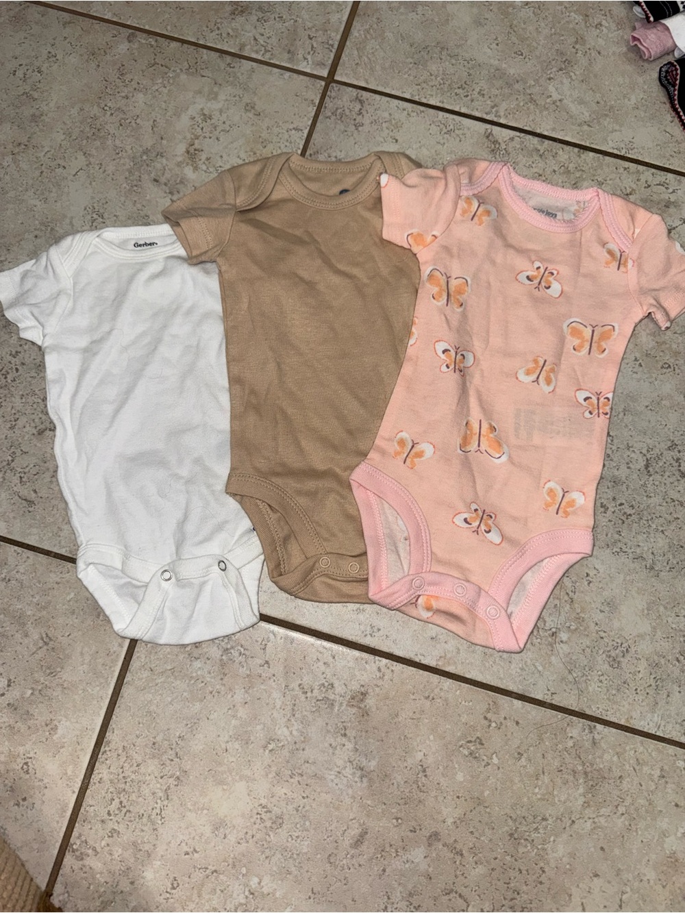Simple Baby One-Piece Bodysuits in White, Tan, and Pink Butterfly